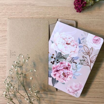 An elegant 'Dear Mum' greeting card with a pink floral peony design