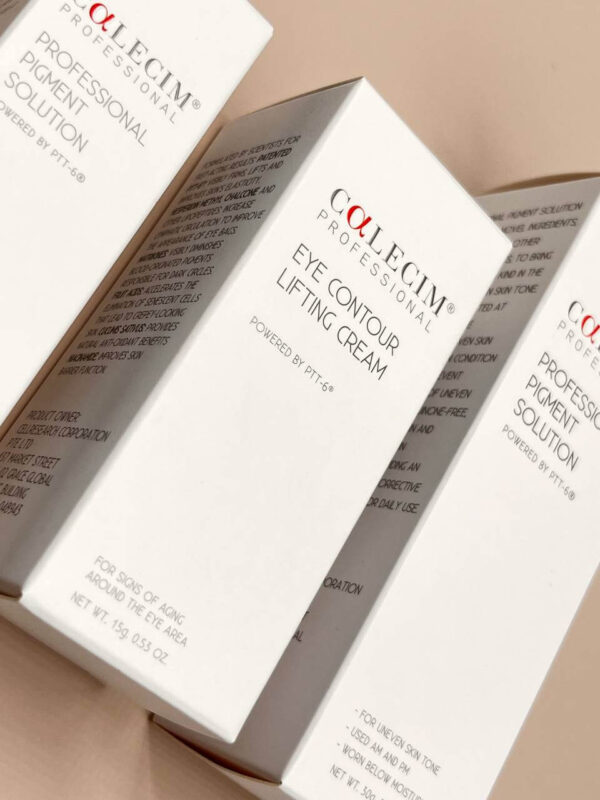 A close-up of several professionally printed white boxes for Calecim Professional skincare products, showcasing a clean and minimalist packaging design for creams and solutions