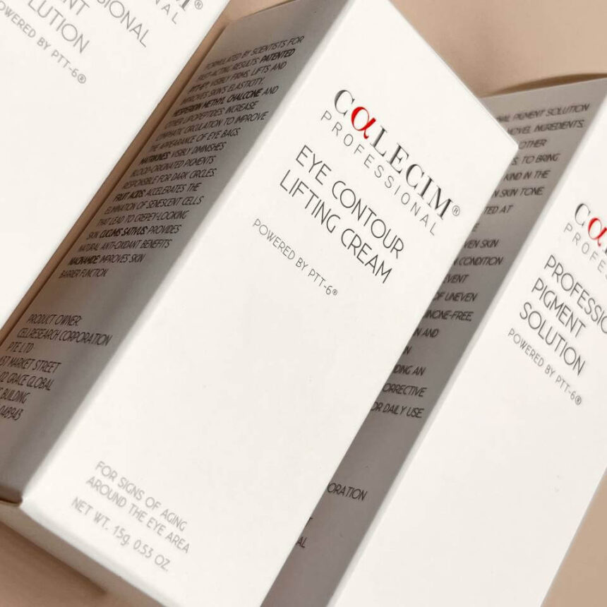 A close-up of several professionally printed white boxes for Calecim Professional skincare products, showcasing a clean and minimalist packaging design for creams and solutions