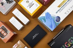 An array of professionally printed commercial product boxes, demonstrating a printing company's capability to produce high-quality, branded packaging for a diverse range of consumer goods.
