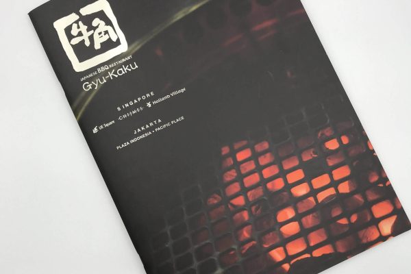 The cover of a professionally printed brochure for Gyu-Kaku Japanese BBQ Restaurant