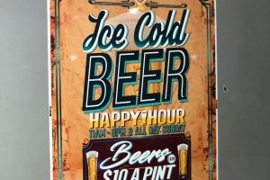 A computer screen displaying the digital proof of a vintage-style happy hour poster for Morganfield's, designed as an A0 PDF file ready for large format printing.