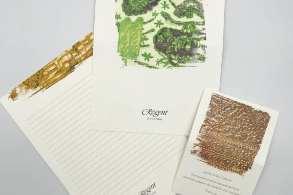 A set of custom-printed hotel stationery for Regent Singapore